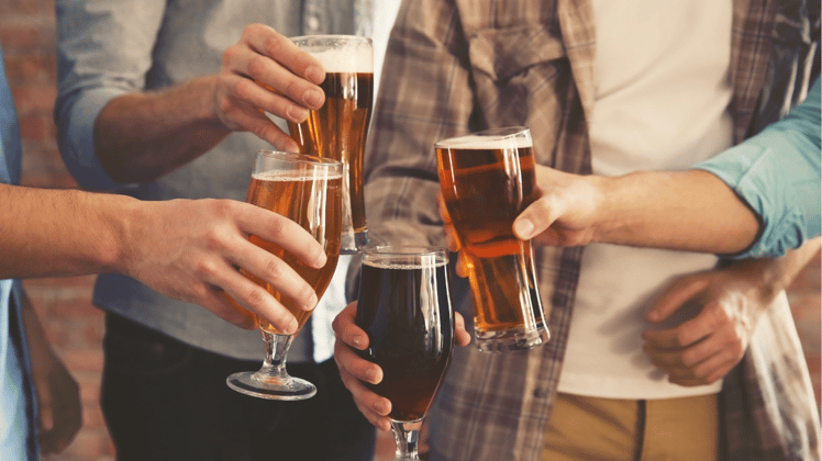 Men with pints of beer